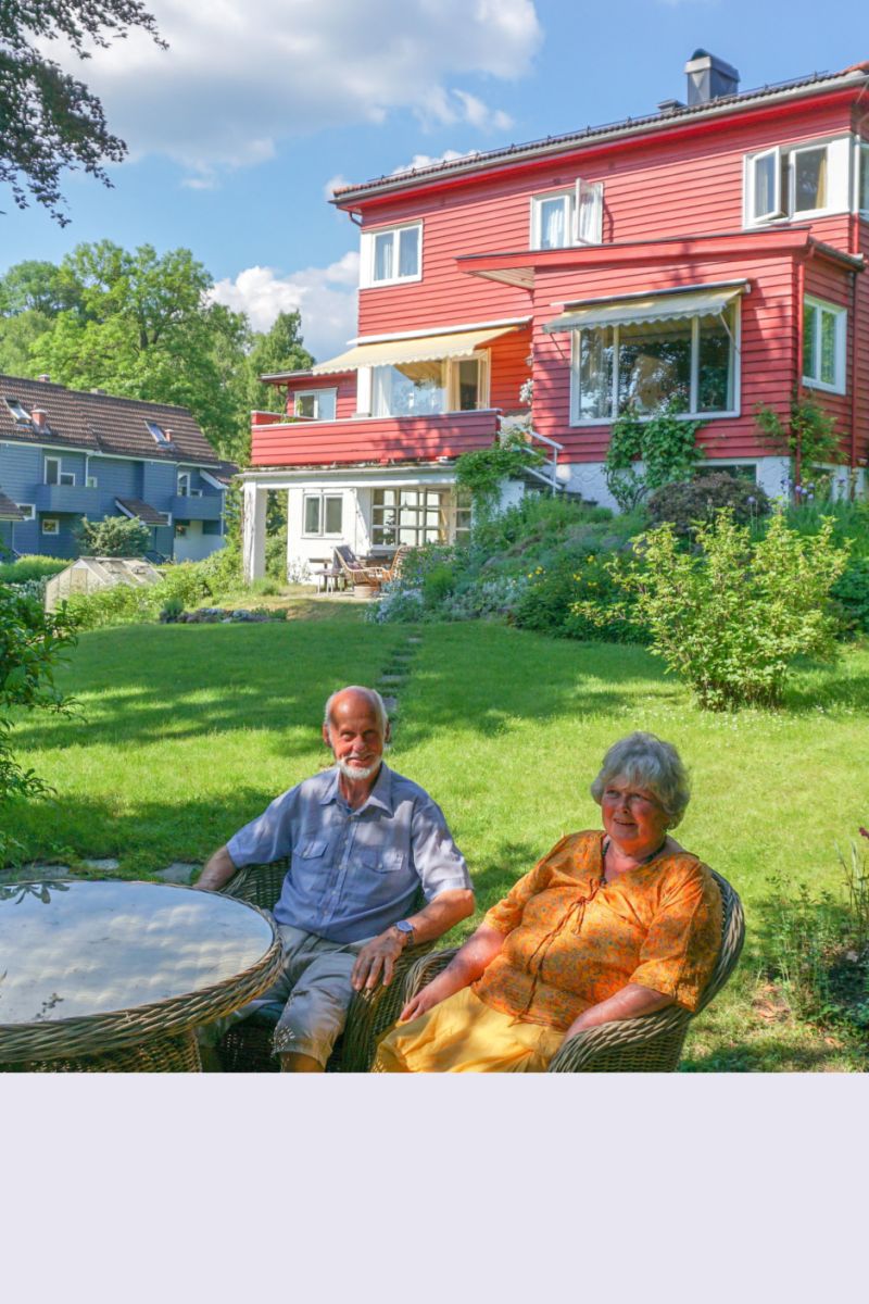Karen and her husband in their garden